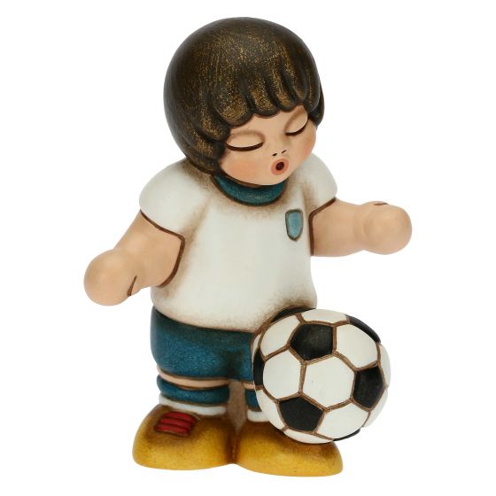 Bimbo calciatore palleggio piccolo